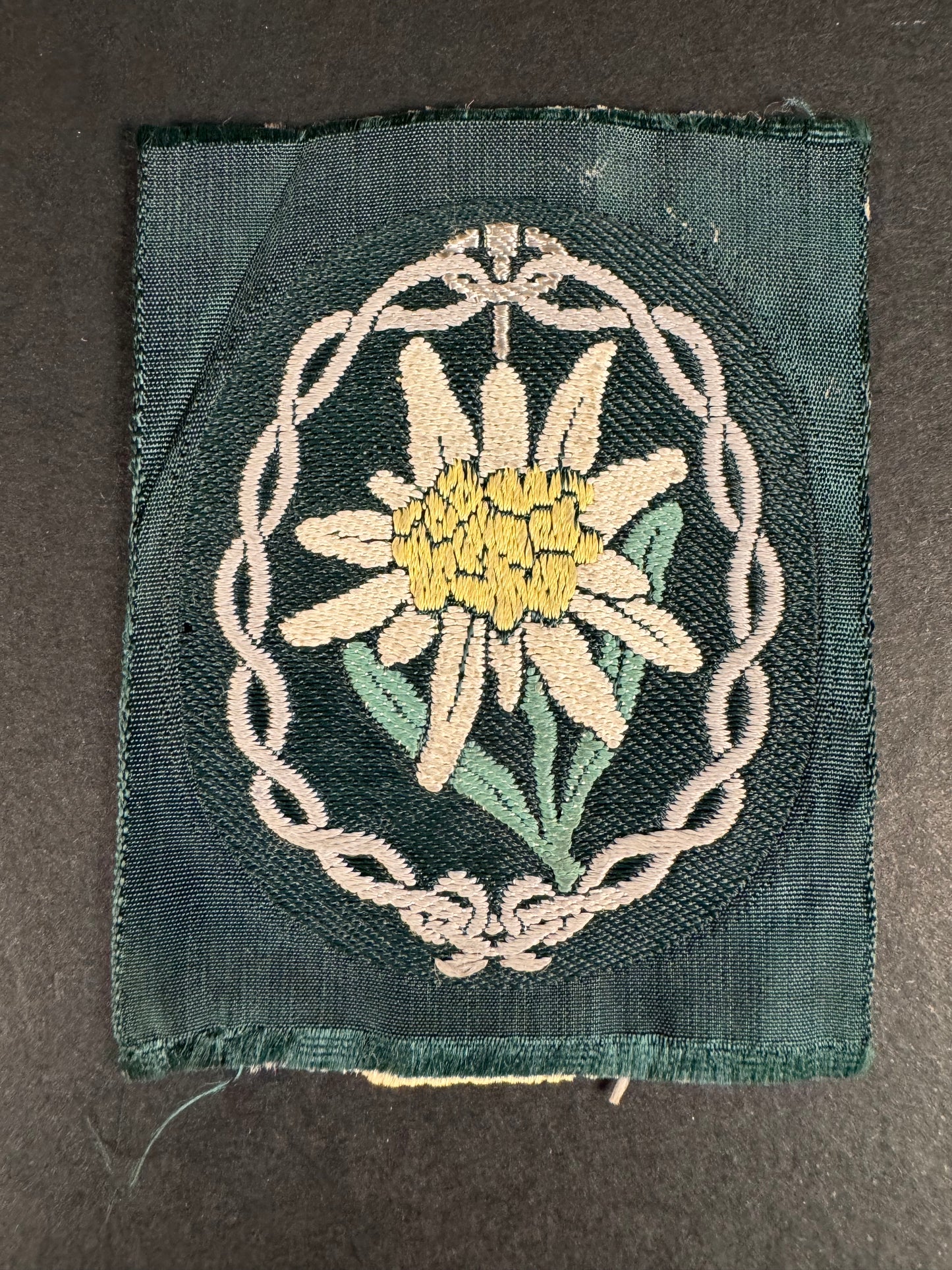 Photo 1 of WW2 German Army Gebirgsjager Edelweiss Mountain Troops BeVo Sleeve Badge - collectible militaria item