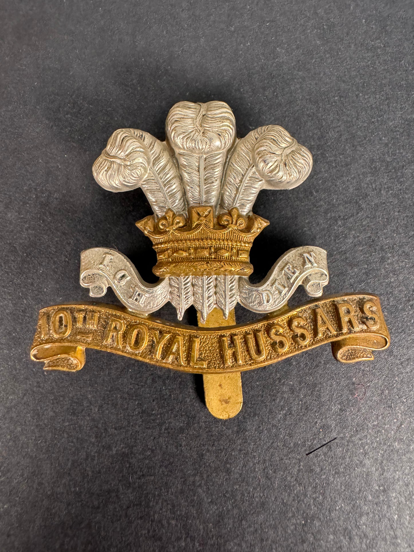Photo 1 of WW1 British Army 10th Royal Hussars Cavalry Cap Badge - collectible militaria item