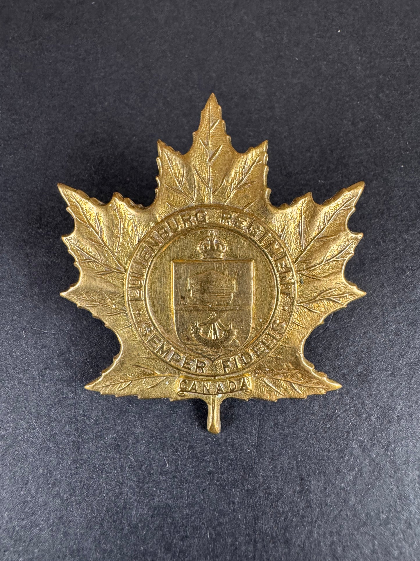 Photo 1 of WW2 Canadian Lunenburg Regiment Cap Badge - collectible militaria item