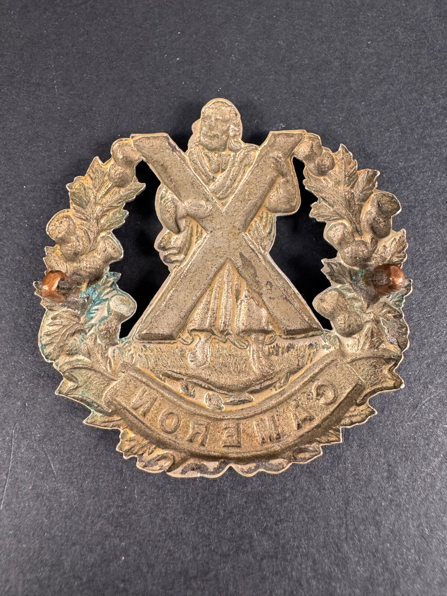 Photo 2 of WW1 British Army Queen's Own Cameron Highlanders Glengarry Cap Badge - collectible militaria item