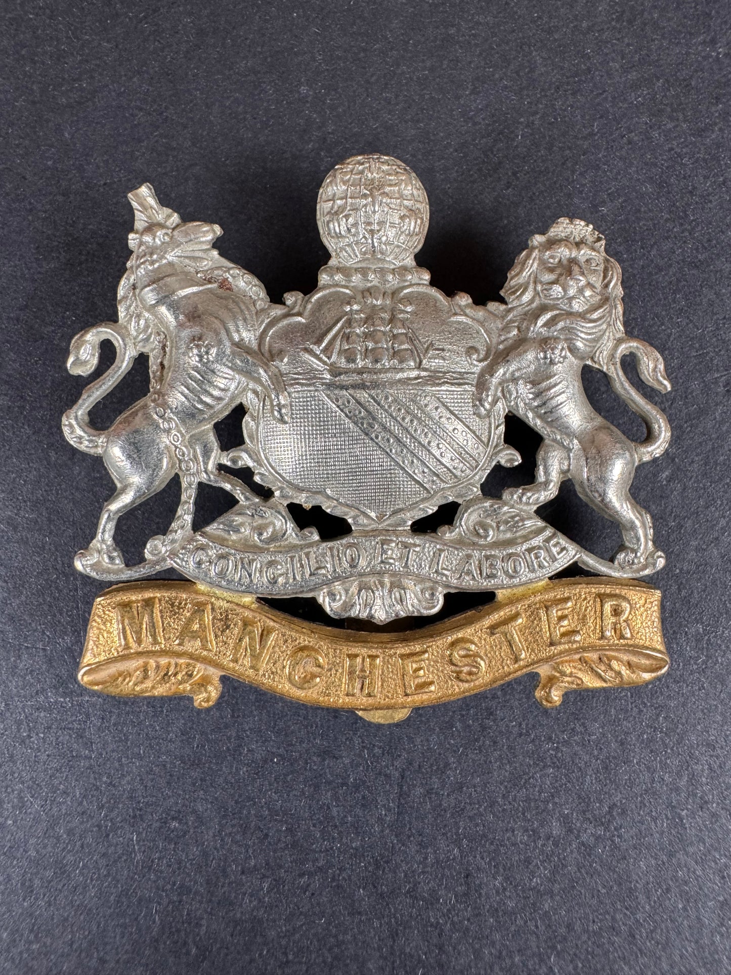 Photo 1 of WW1 British Army Manchester Regiment Cap Badge - collectible militaria item
