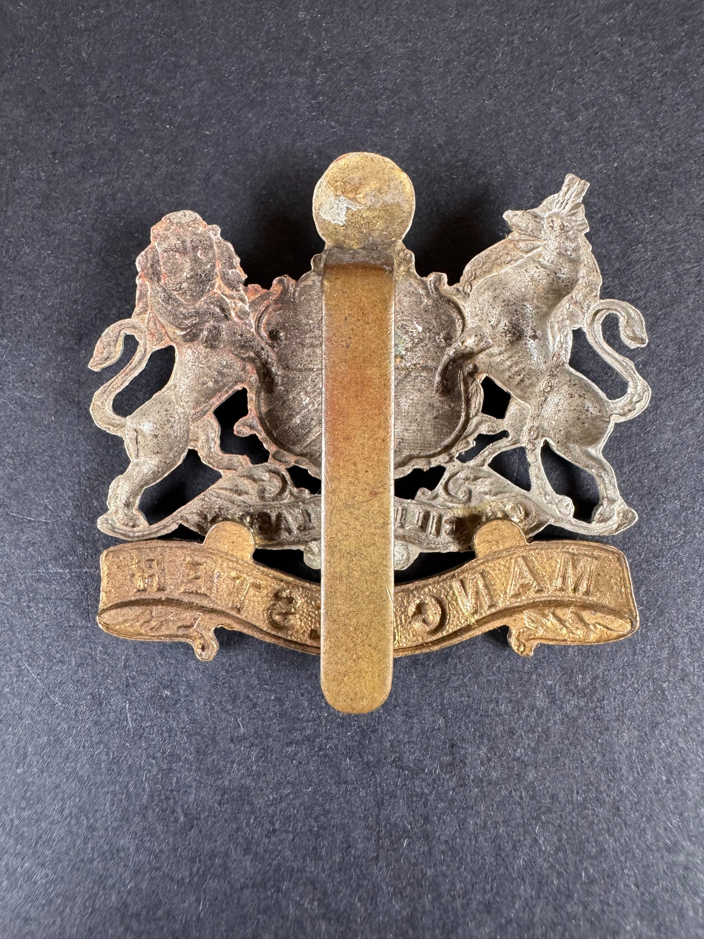 Photo 2 of WW1 British Army Manchester Regiment Cap Badge - collectible militaria item