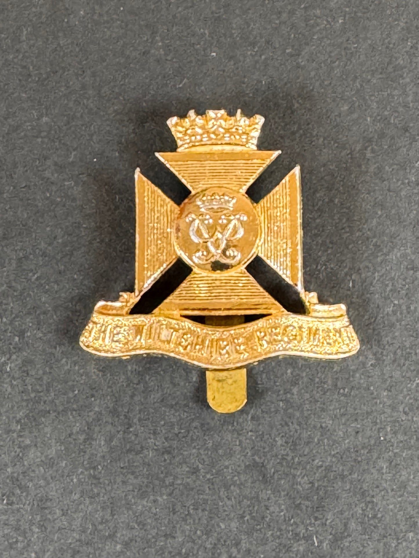 Photo 1 of After WW2 Wiltshire Regiment Anodised Cap Badge - collectible militaria item
