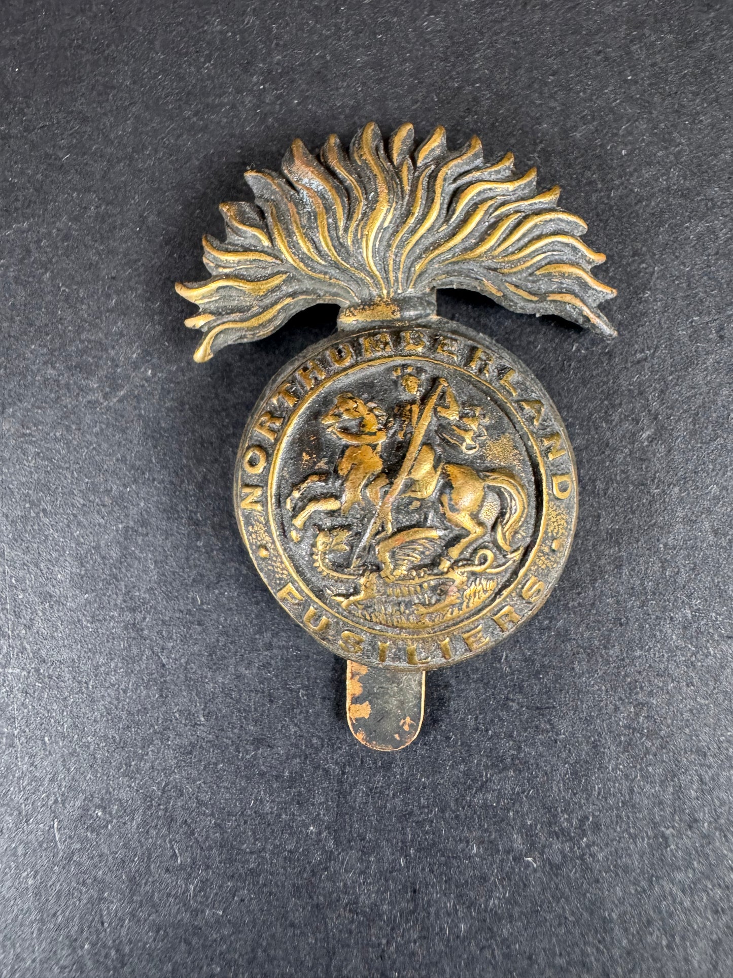 Photo 1 of Pre WW1 British Army 1st Volunteer Battalion Northumberland Fusiliers Cap Badge - collectible militaria item
