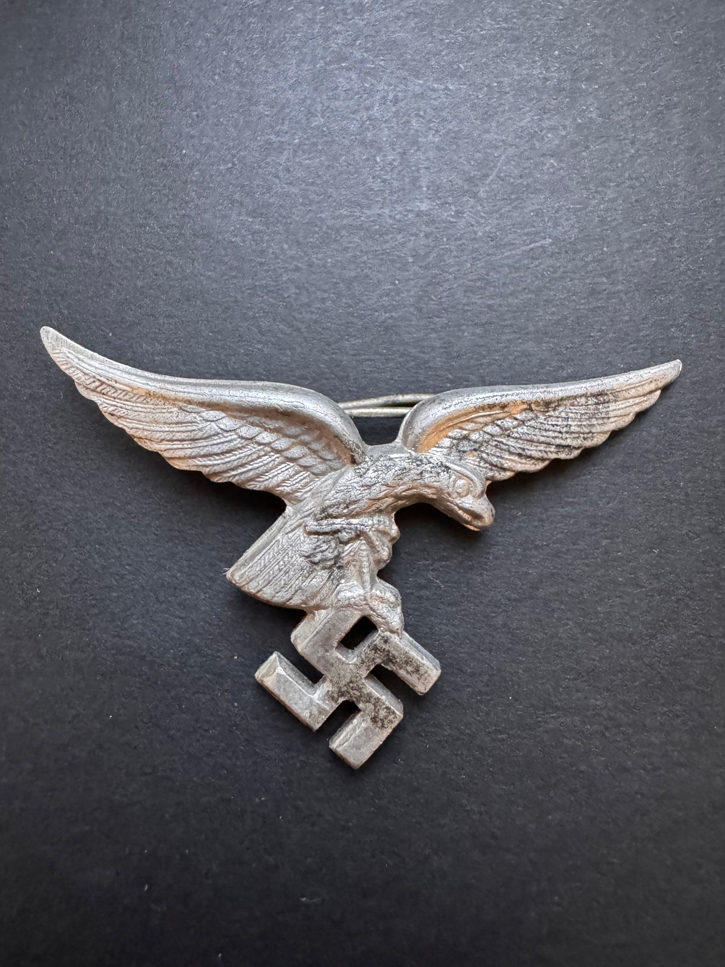 Photo 2 of Early Luftwaffe Visor Cap Badge Assmann - collectible militaria item
