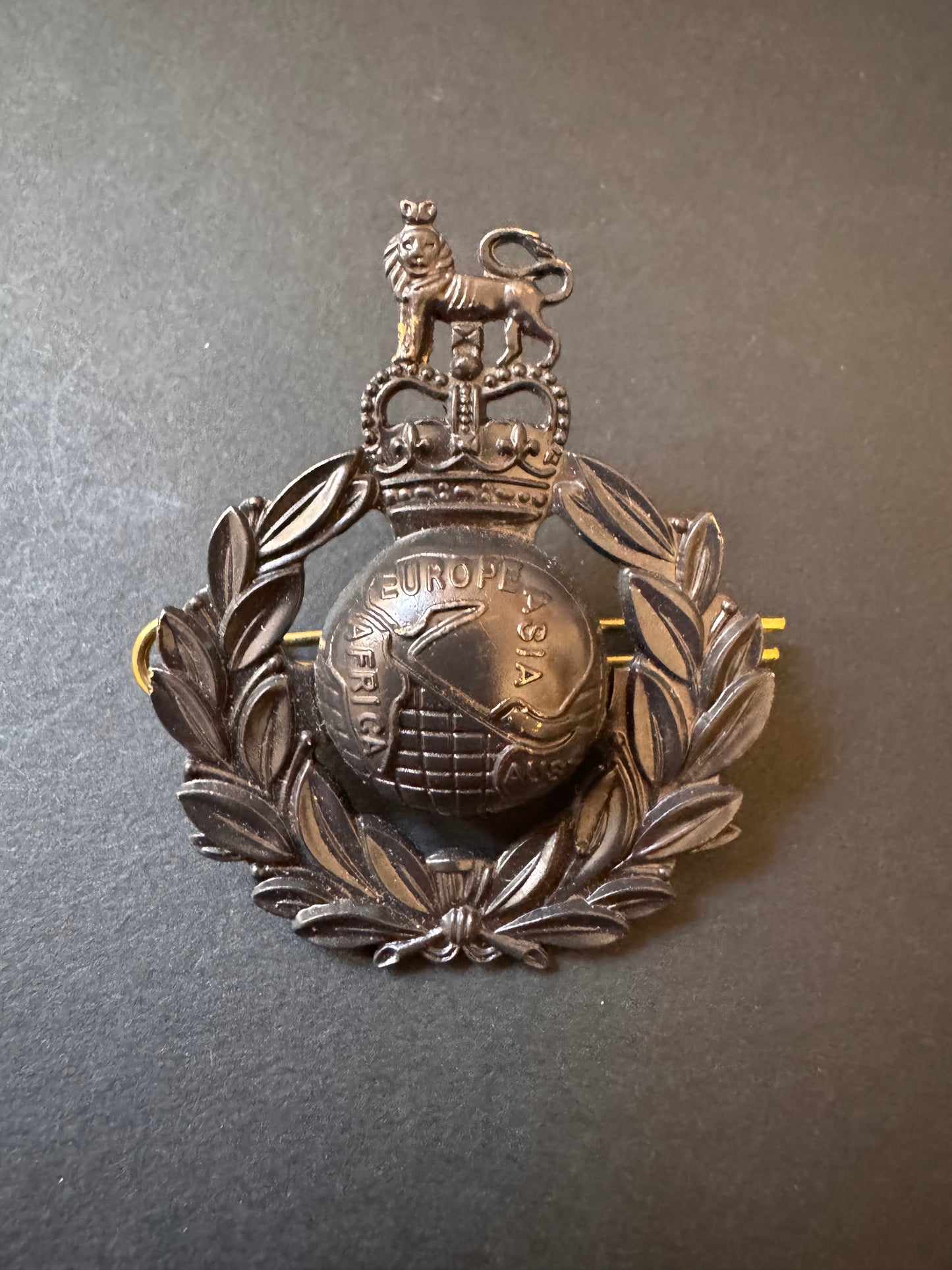 Photo 1 of After WW2 British Royal Marines Cap Badge - collectible militaria item