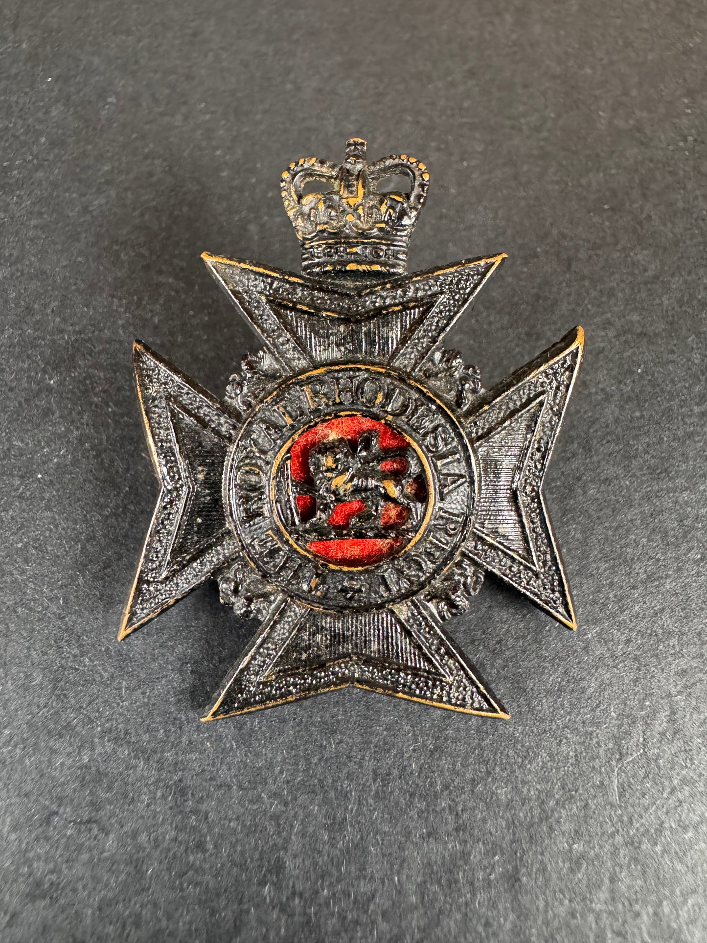 Photo 1 of The Royal Rhodesia Regiment Cap Badge - collectible militaria item