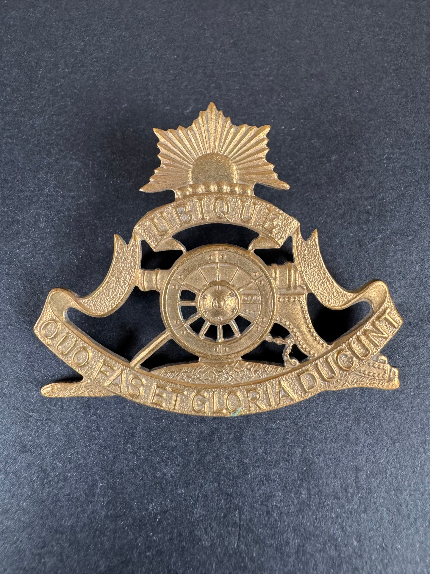 Photo 1 of Post WW2 South African Orange Free State University Regiment Artillery Cap Badge - collectible militaria item
