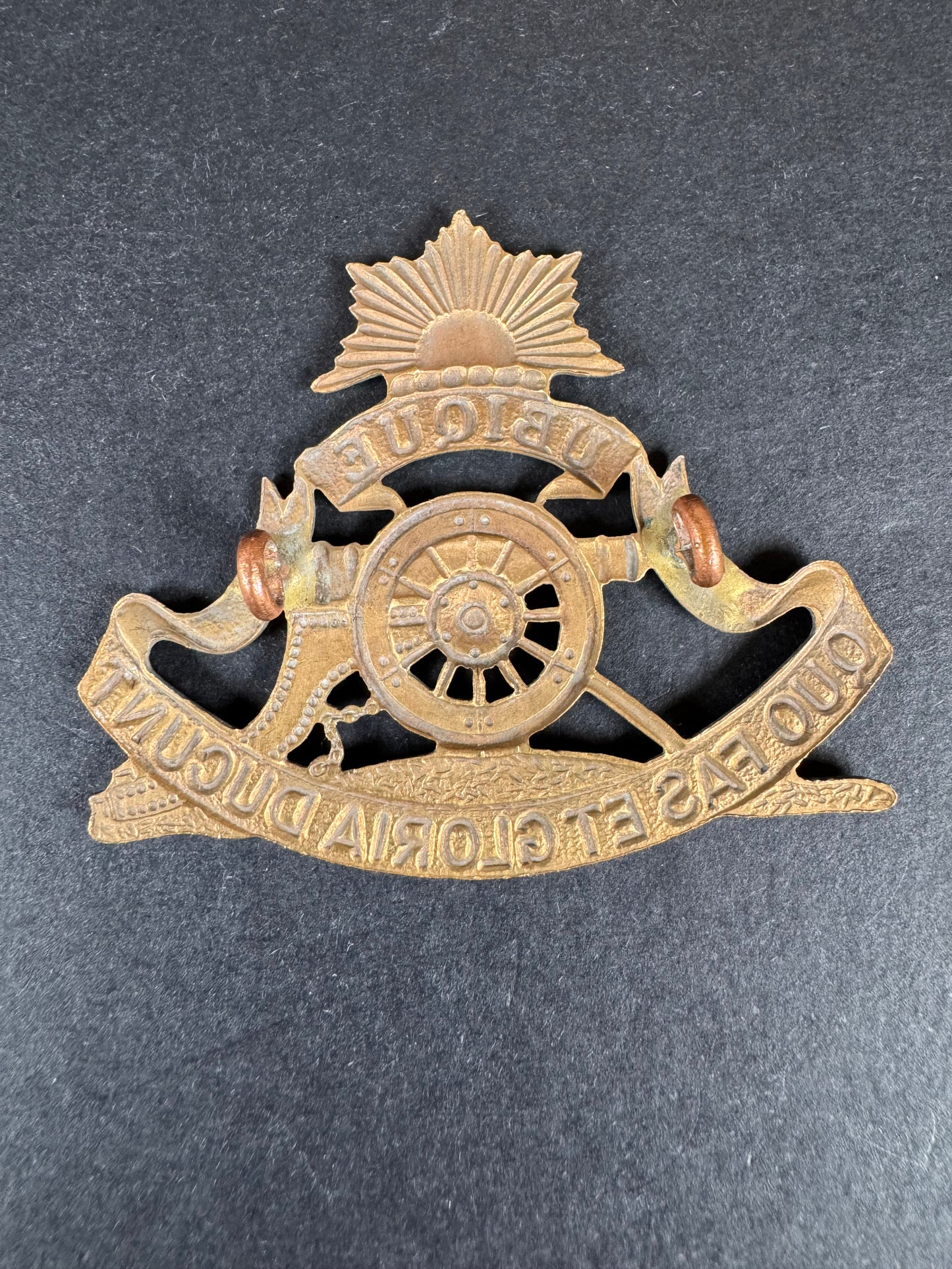 Photo 2 of Post WW2 South African Orange Free State University Regiment Artillery Cap Badge - collectible militaria item