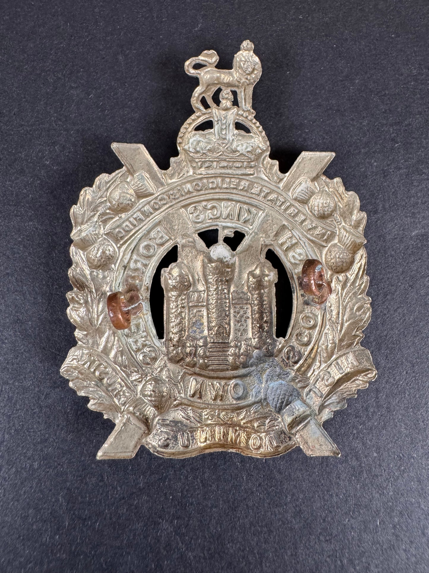 Photo 2 of WW1 British Army King's Own Scottish Borderers Regiment Cap Badge - collectible militaria item