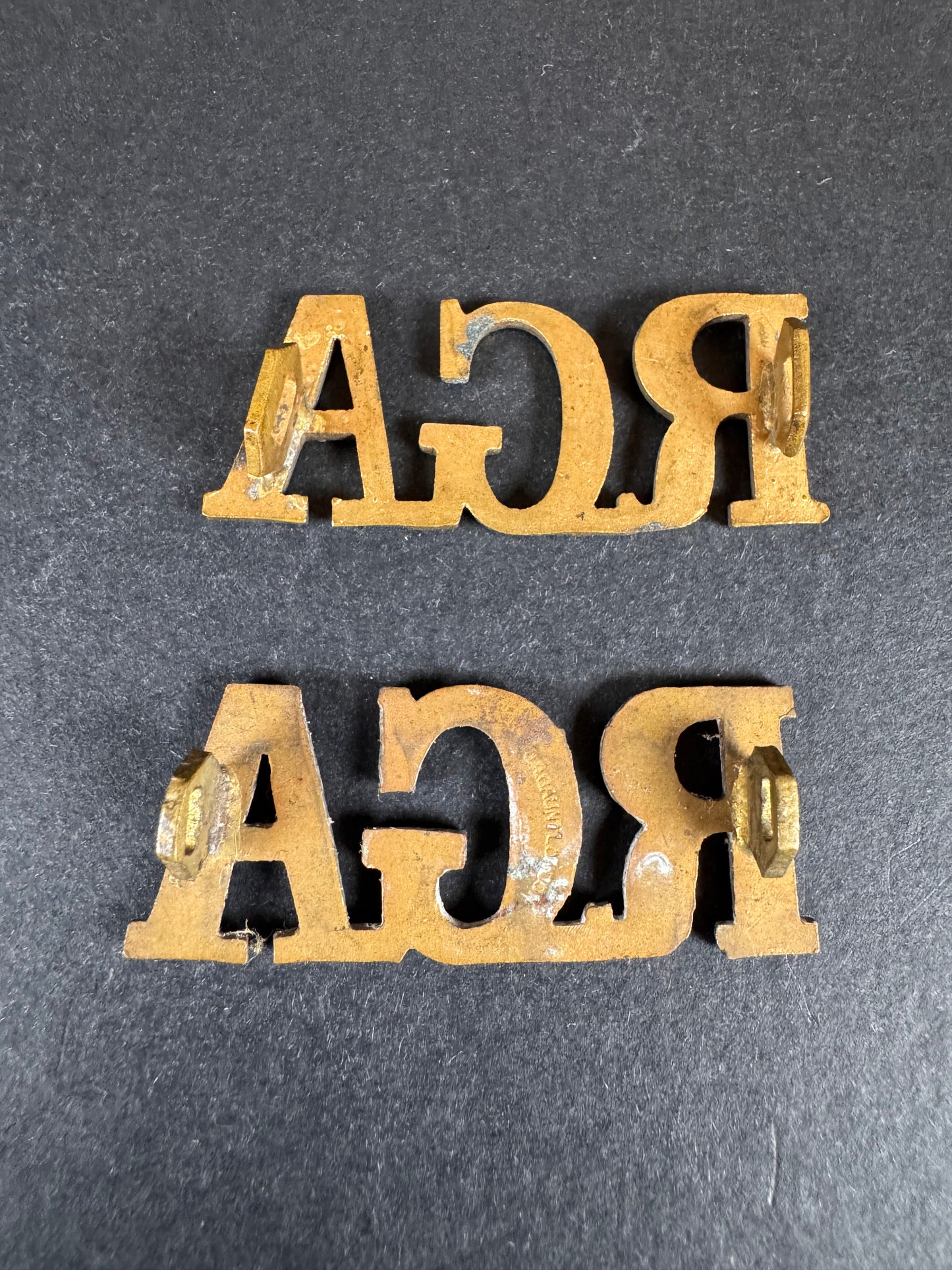 Photo 2 of WW1 British Army Royal Garrison Artillery Uniform Shoulder Title Badges - collectible militaria item