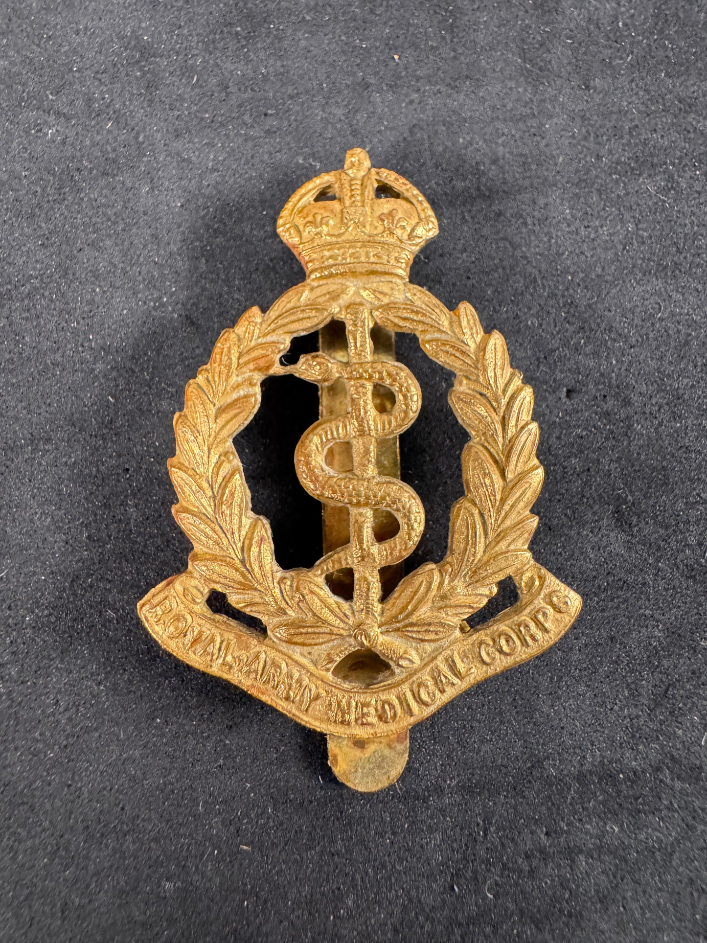 Photo 1 of WW2 British Royal Army Medical Corps (RAMC) Cap Badge - collectible militaria item