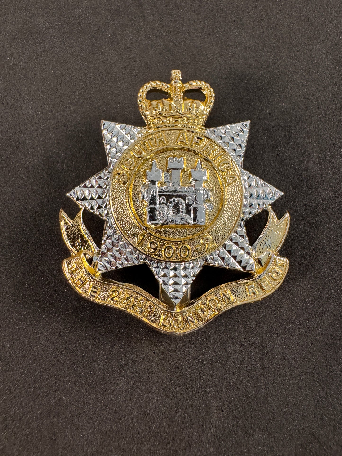 Photo 1 of British Territorial Army 23rd London Regiment Cap Badge - collectible militaria item
