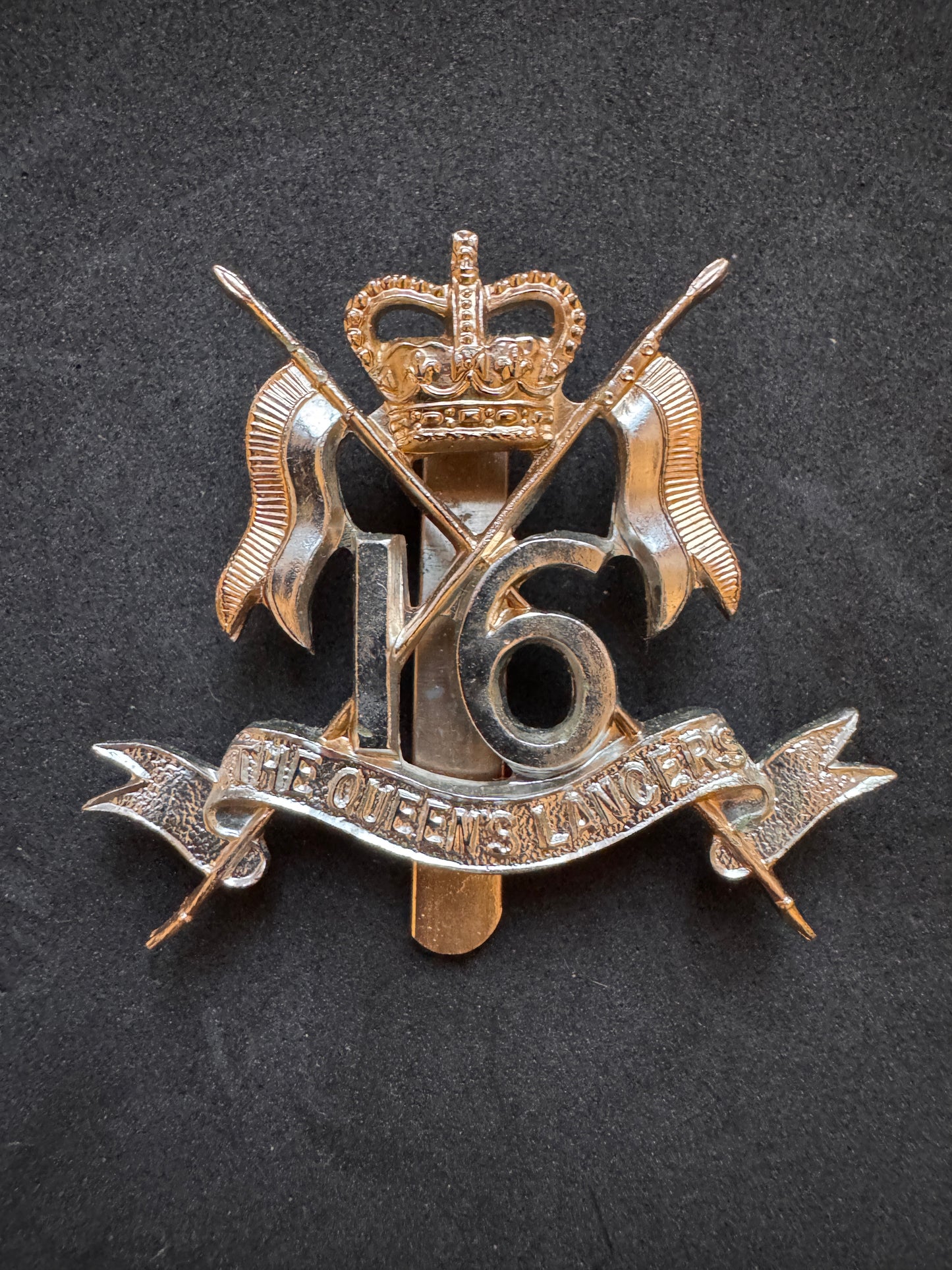 Photo 1 of After WW2 British Army 16th 5th Queen's Royal Lancers Cap Badge - collectible militaria item