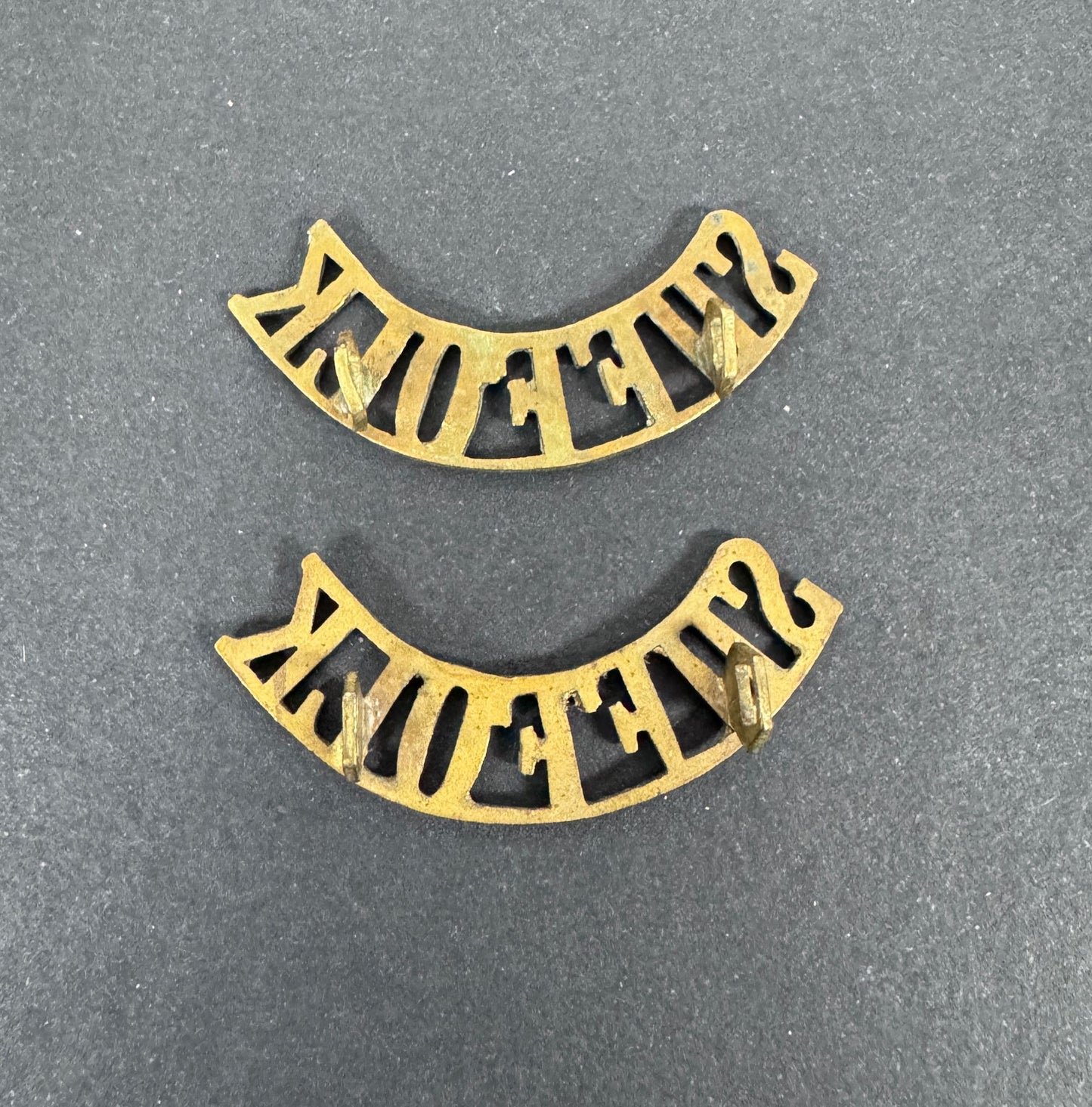 British Army Suffolk Regiment Shoulder Title Badges (Pair) – A matching pair of original uniform shoulder titles of the Su...