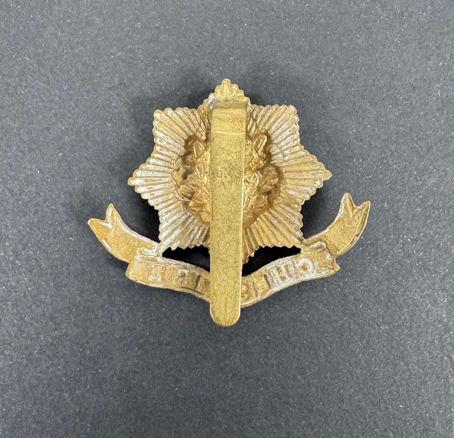 WW1 British Army Cheshire Regiment War Economy Cap Badge – An original other ranks war economy cap badge of The Cheshire R...
