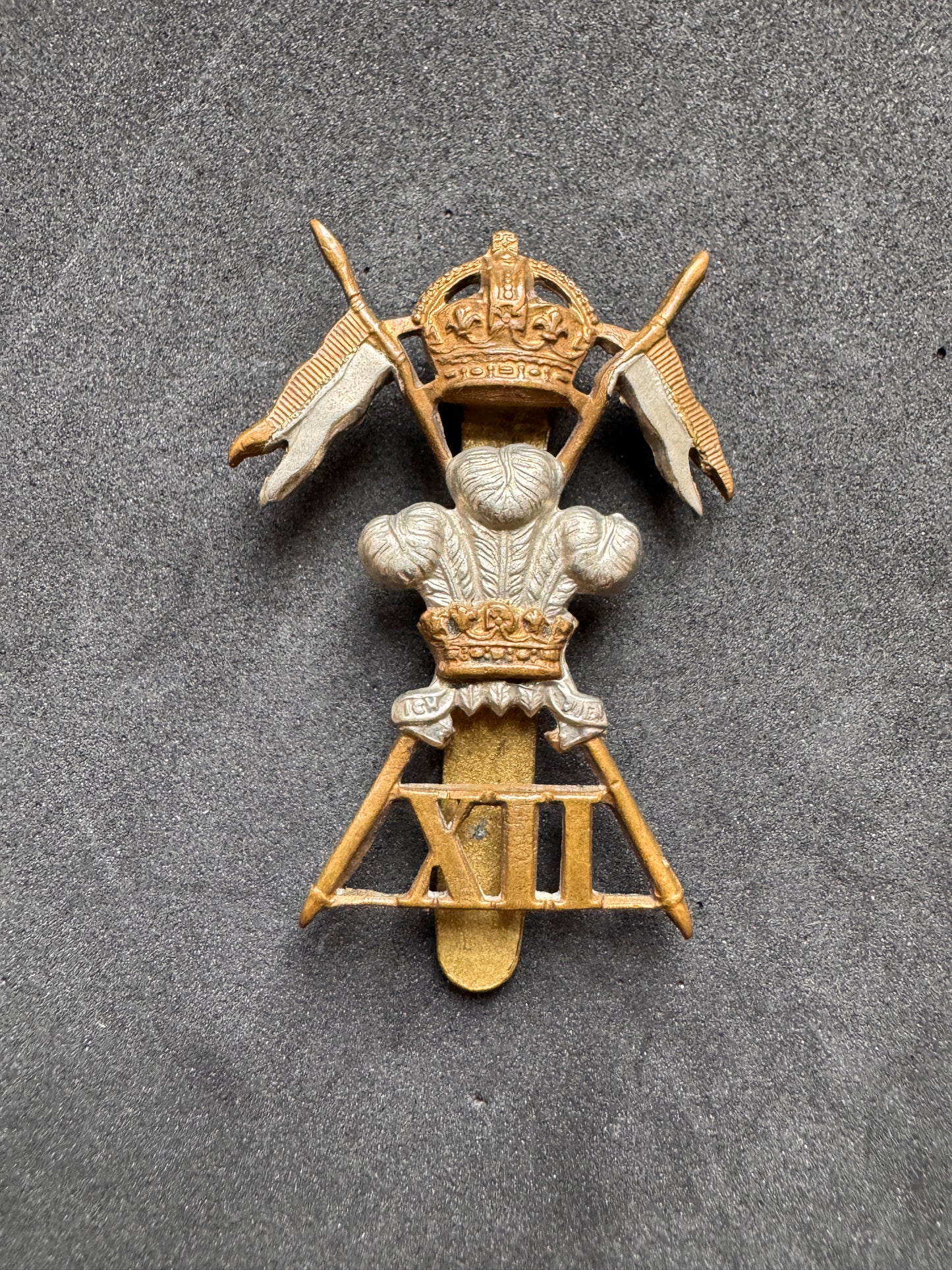 Photo 1 of WW1 British Army 12th Lancers Cap Badge XII - collectible militaria item