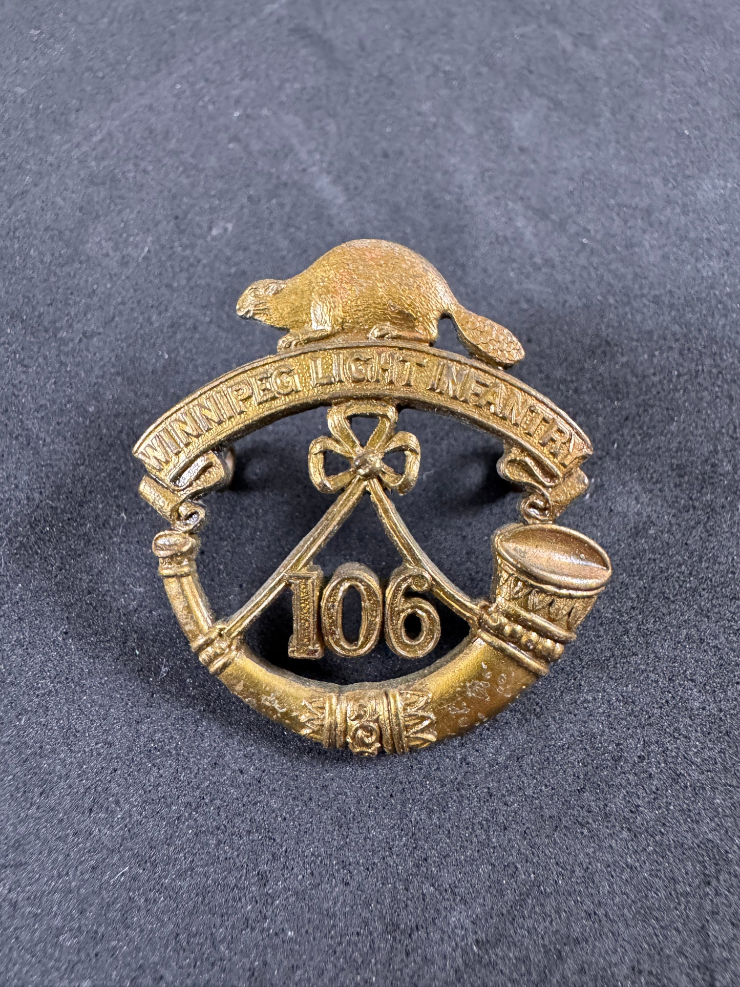 Photo 1 of WWI Canadian Army 106th Winnipeg Light Infantry Cap Badge - collectible militaria item