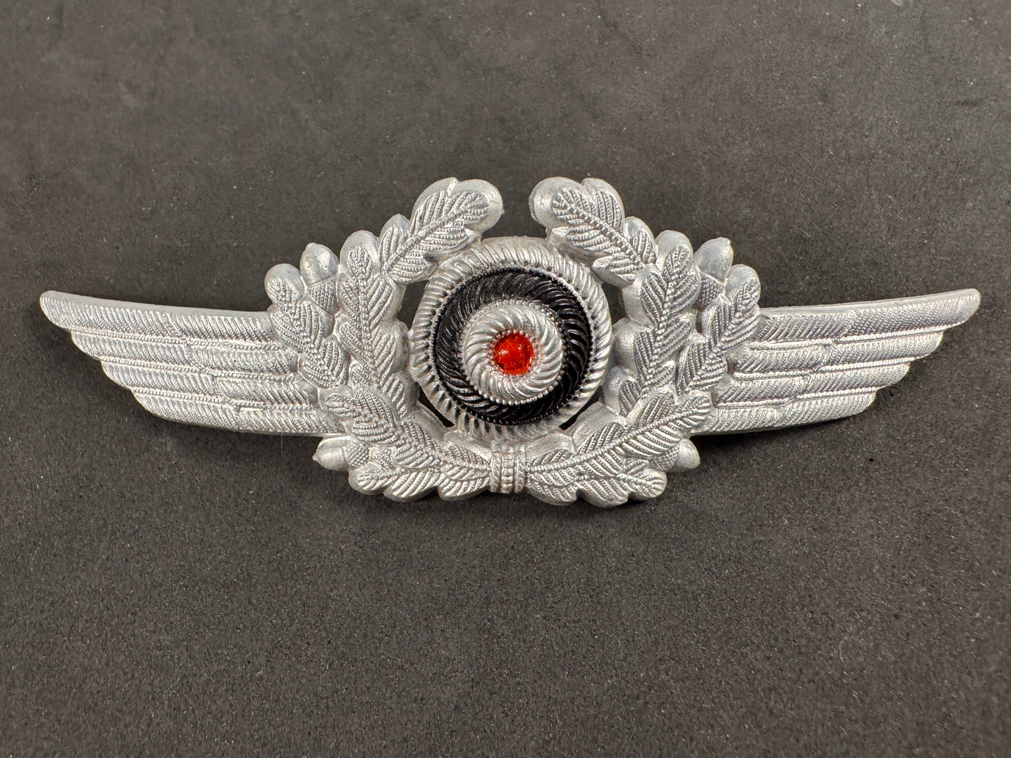 Photo 1 of WW2 German Luftwaffe EM/NCO Visor Cap Cockade Wreath - DRGM - collectible militaria item