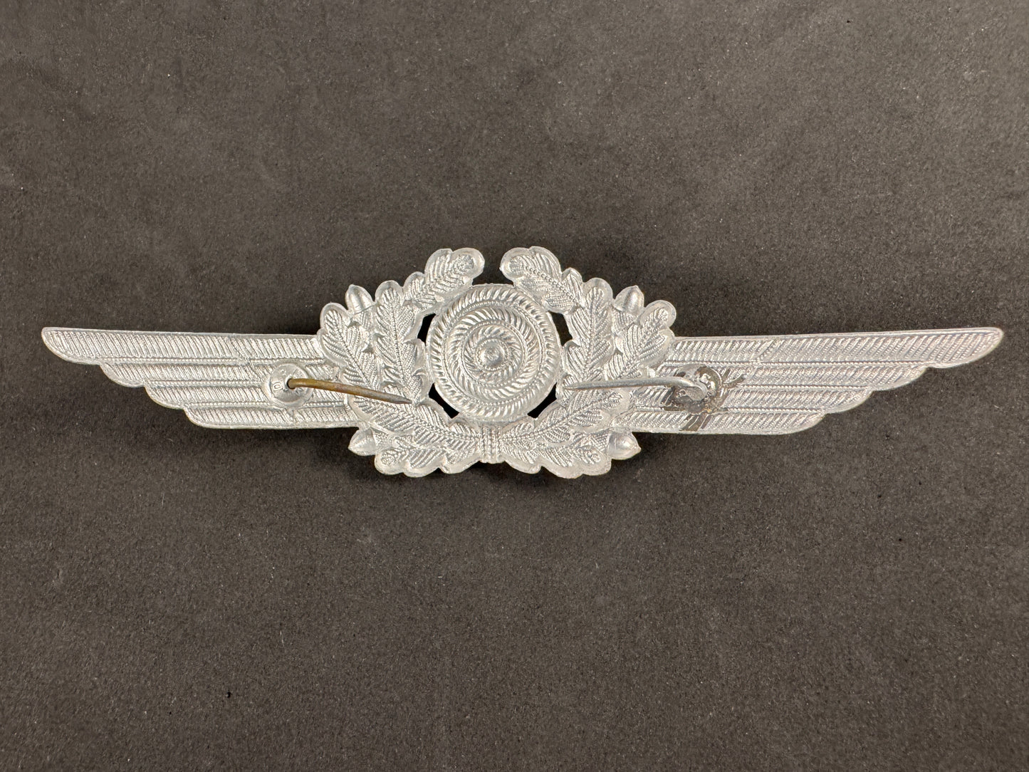 Photo 2 of WW2 German Luftwaffe EM/NCO Visor Cap Cockade Wreath - DRGM - collectible militaria item