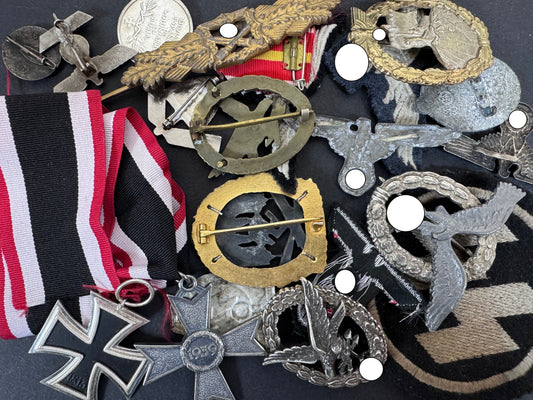 a collection of german awards from world war two, all part of a blog post on fakes and reproductions.