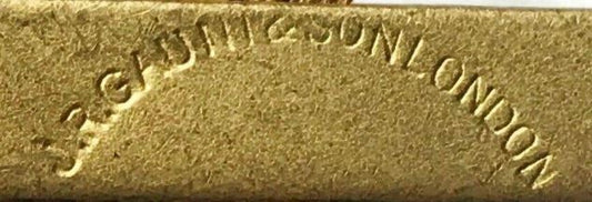 an original J R Gaunt & sons London cap badge maker mark.