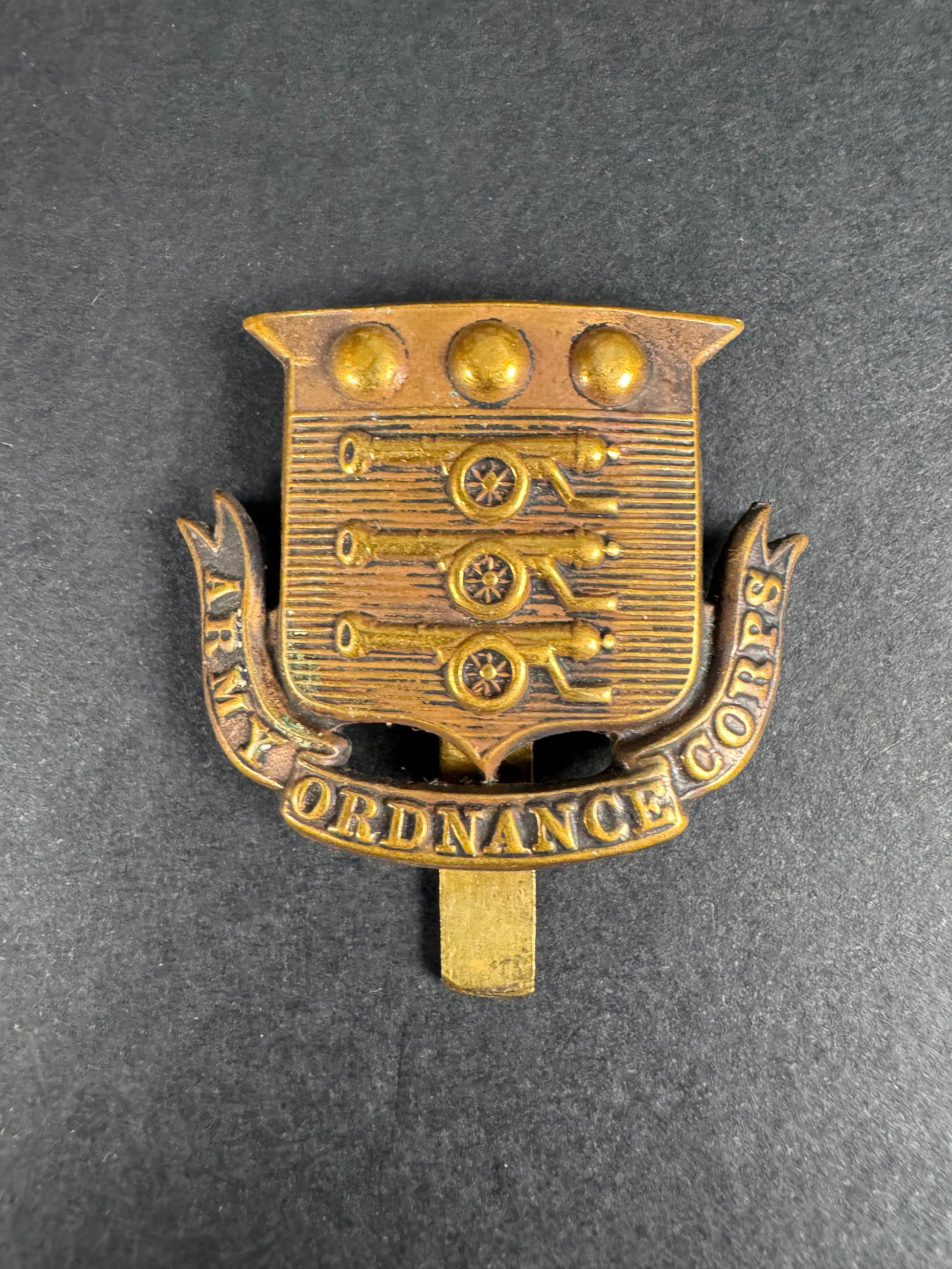 Photo 1 of WW1 British Army Ordnance Corps Cap Badge AOC - collectible militaria item