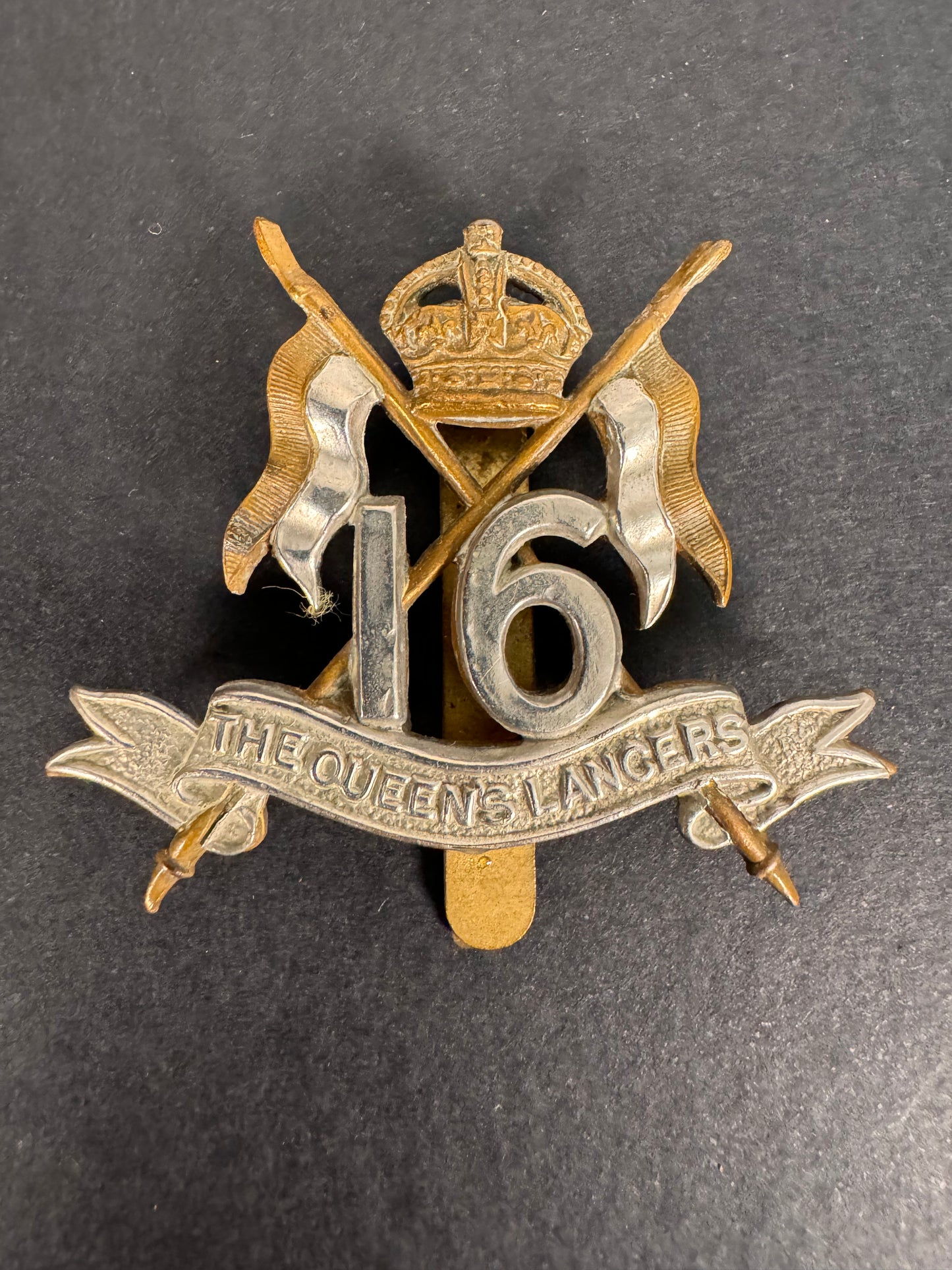 Photo 1 of WW1 British Army 16th The Queen’s Lancers Cavalry Cap Badge - collectible militaria item