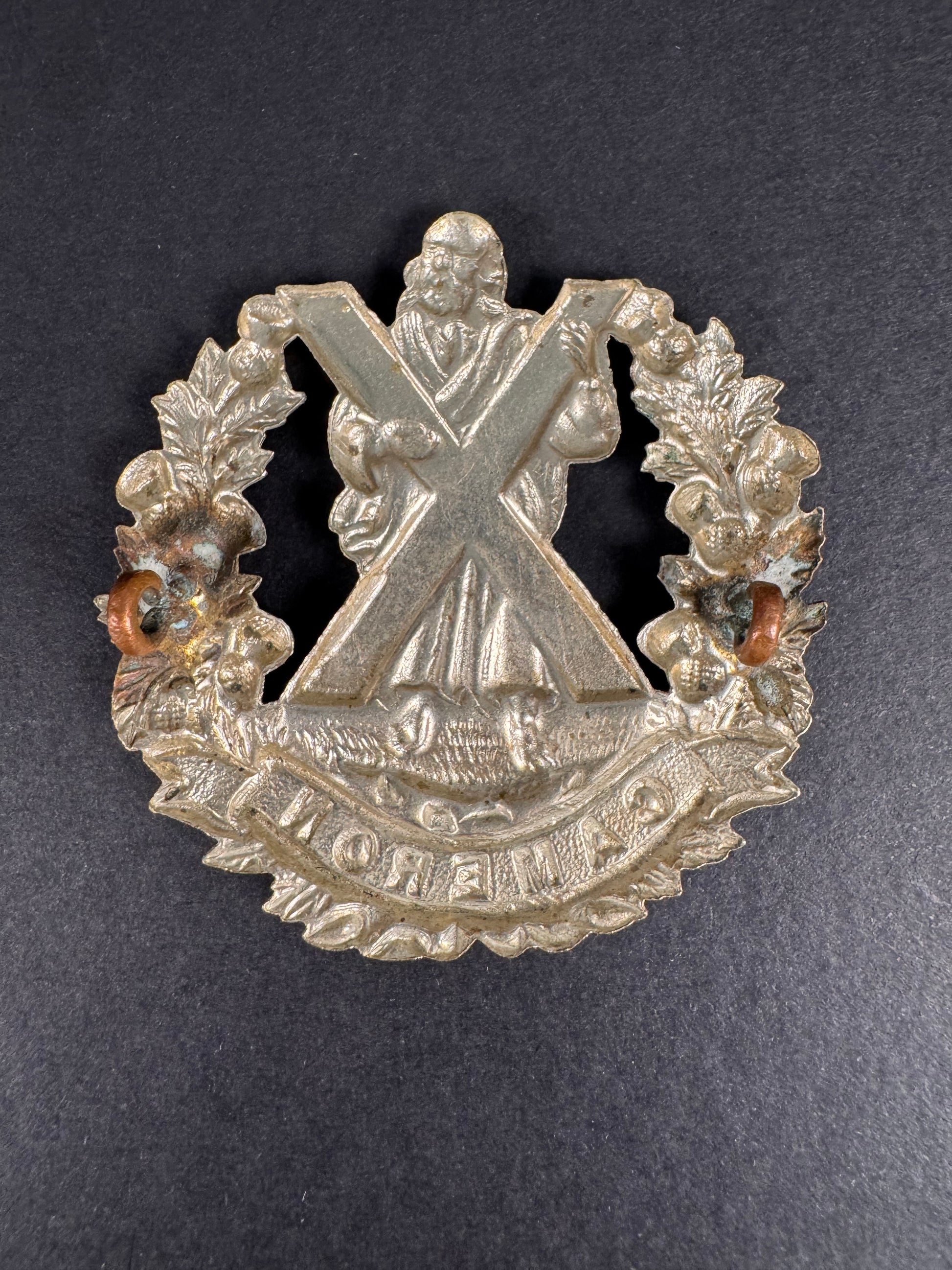 Photo 2 of WW2 British Army Queen's Own Cameron Highlanders Glengarry Cap Badge - collectible militaria item