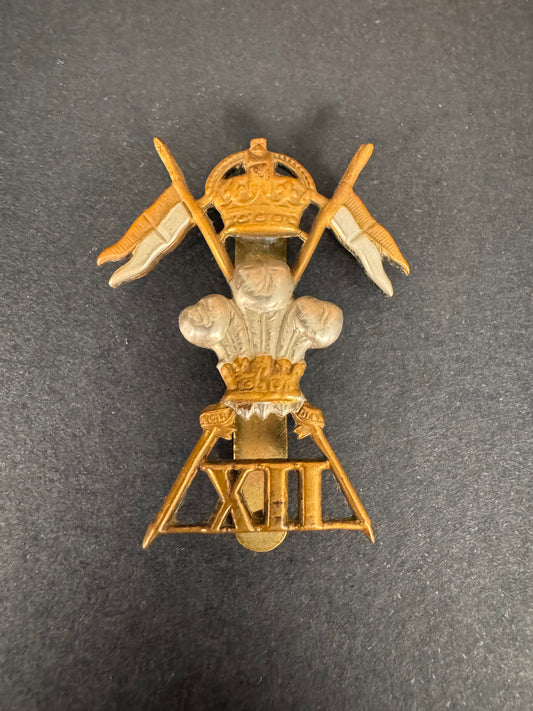 Photo 1 of WW1 British Army 12th Lancers Cavalry Cap Badge XII L - collectible militaria item