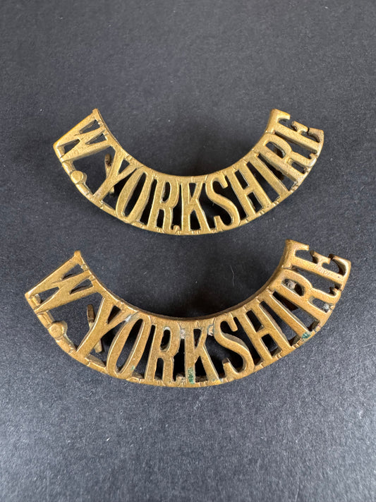 Photo 1 of WW1 British Army West Yorkshire Regiment Uniform Shoulder Title Badges - collectible militaria item