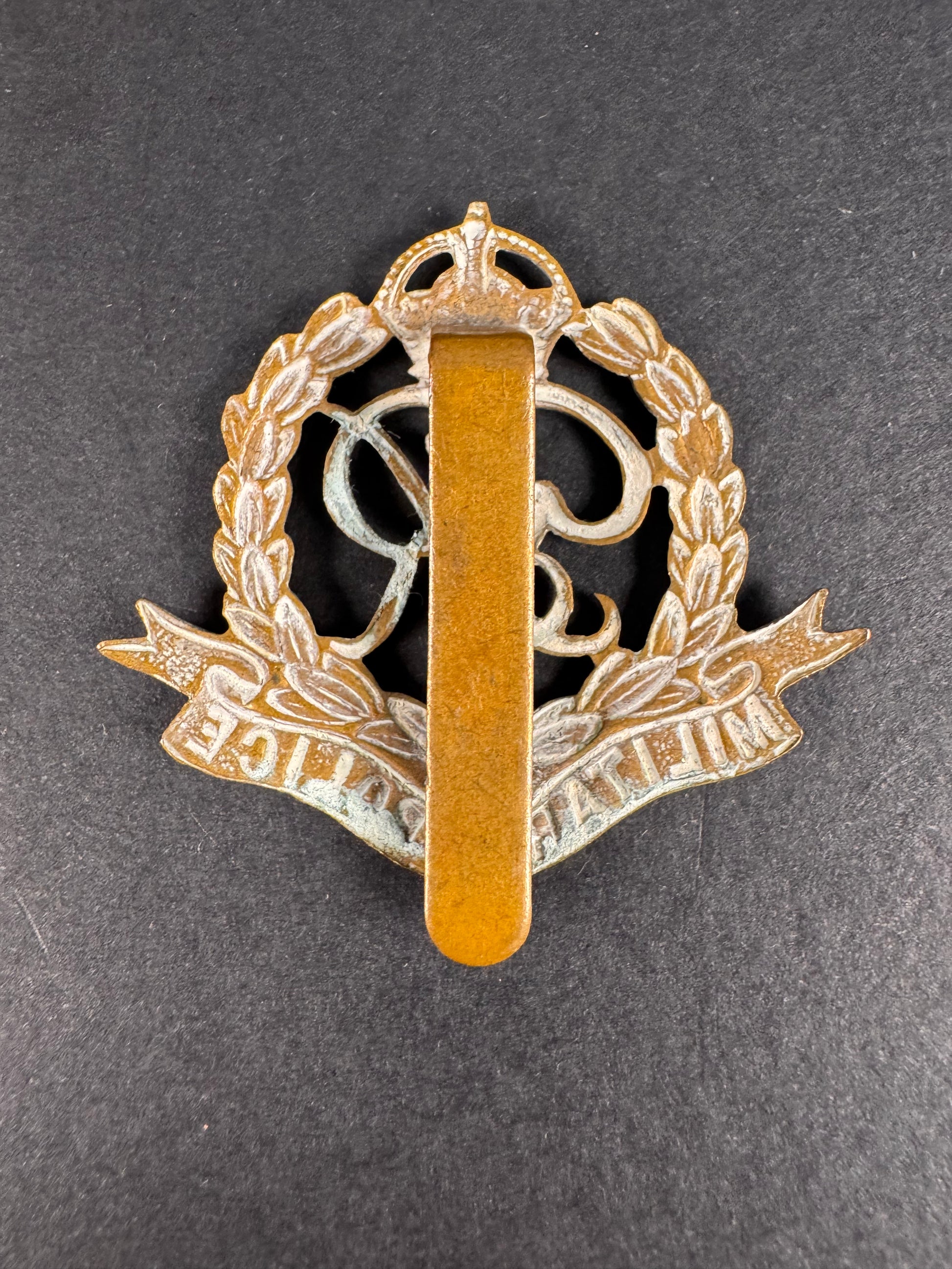 Photo 2 of WW2 British Army Military Police Cap Badge GR IV - collectible militaria item