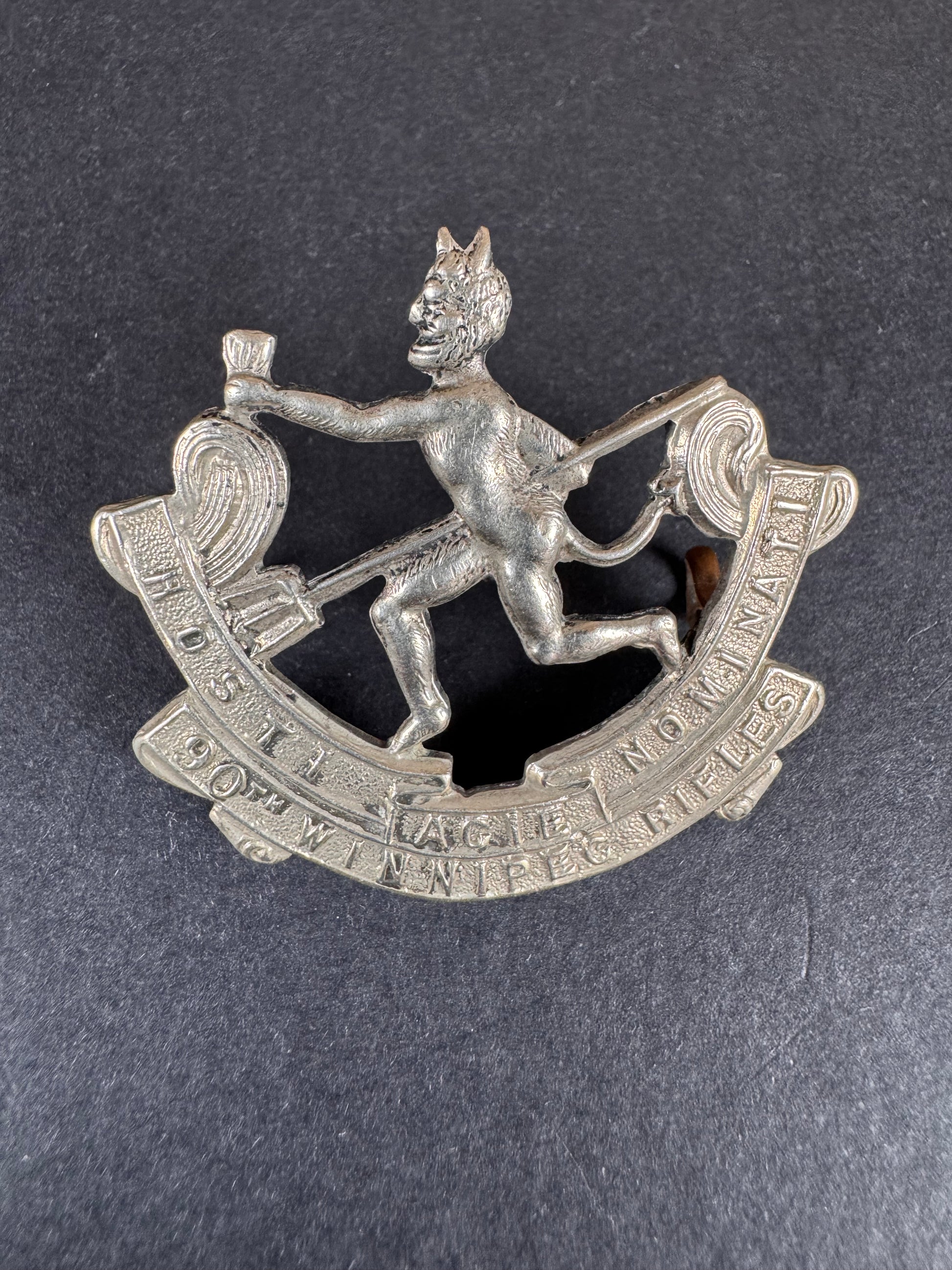 Photo 1 of WW1 Canadian Army 90th Winnipeg Rifles Cap Badge - collectible militaria item