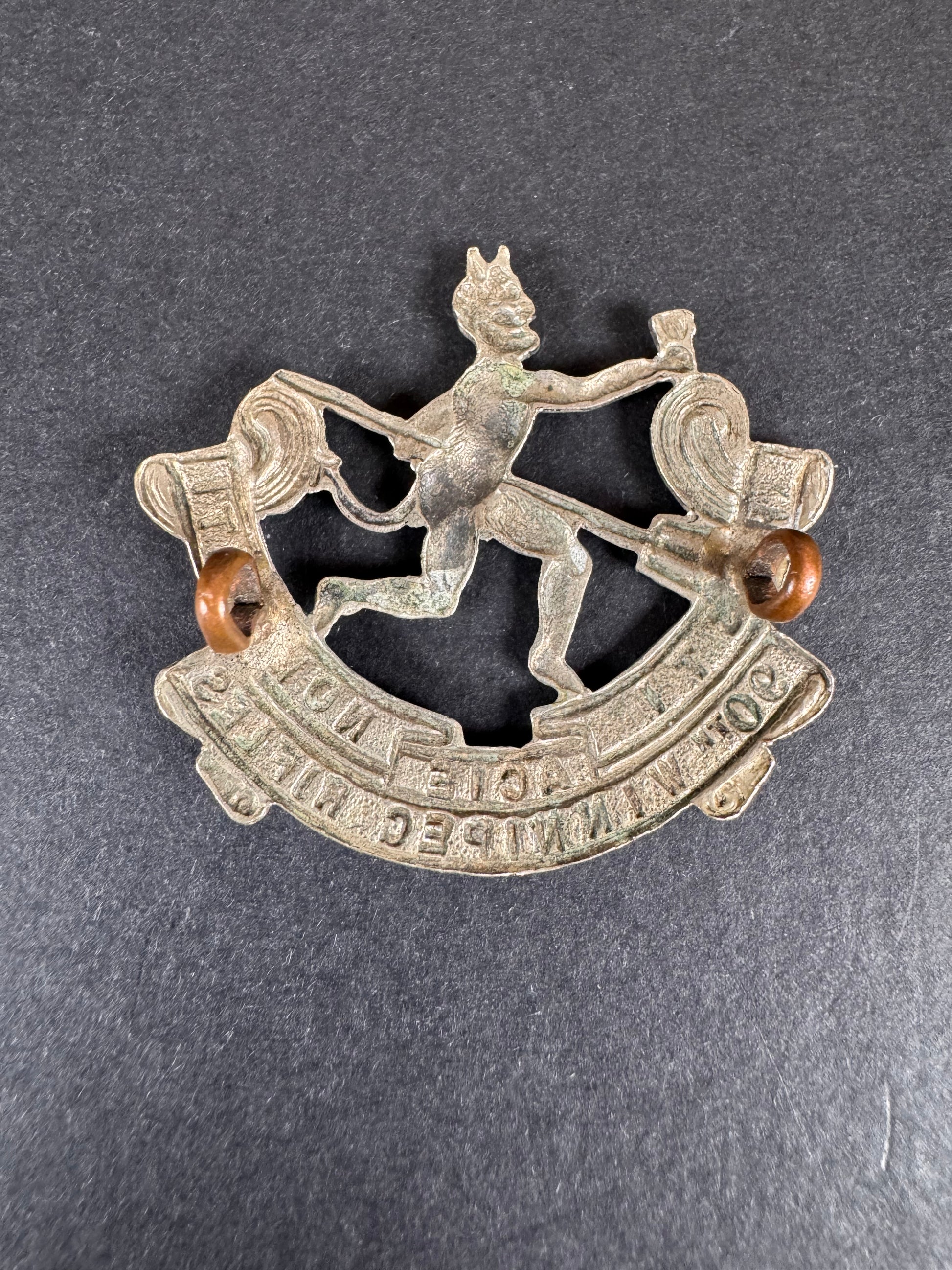 Photo 2 of WW1 Canadian Army 90th Winnipeg Rifles Cap Badge - collectible militaria item