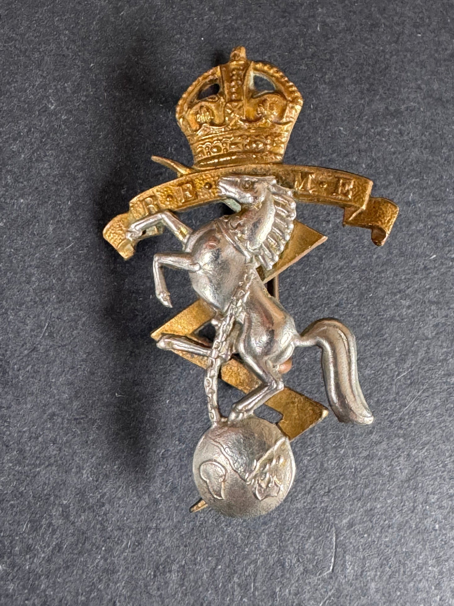 Photo 1 of After WW2 British Army Royal Electrical & Mechanical Engineers Cap Badge - collectible militaria item