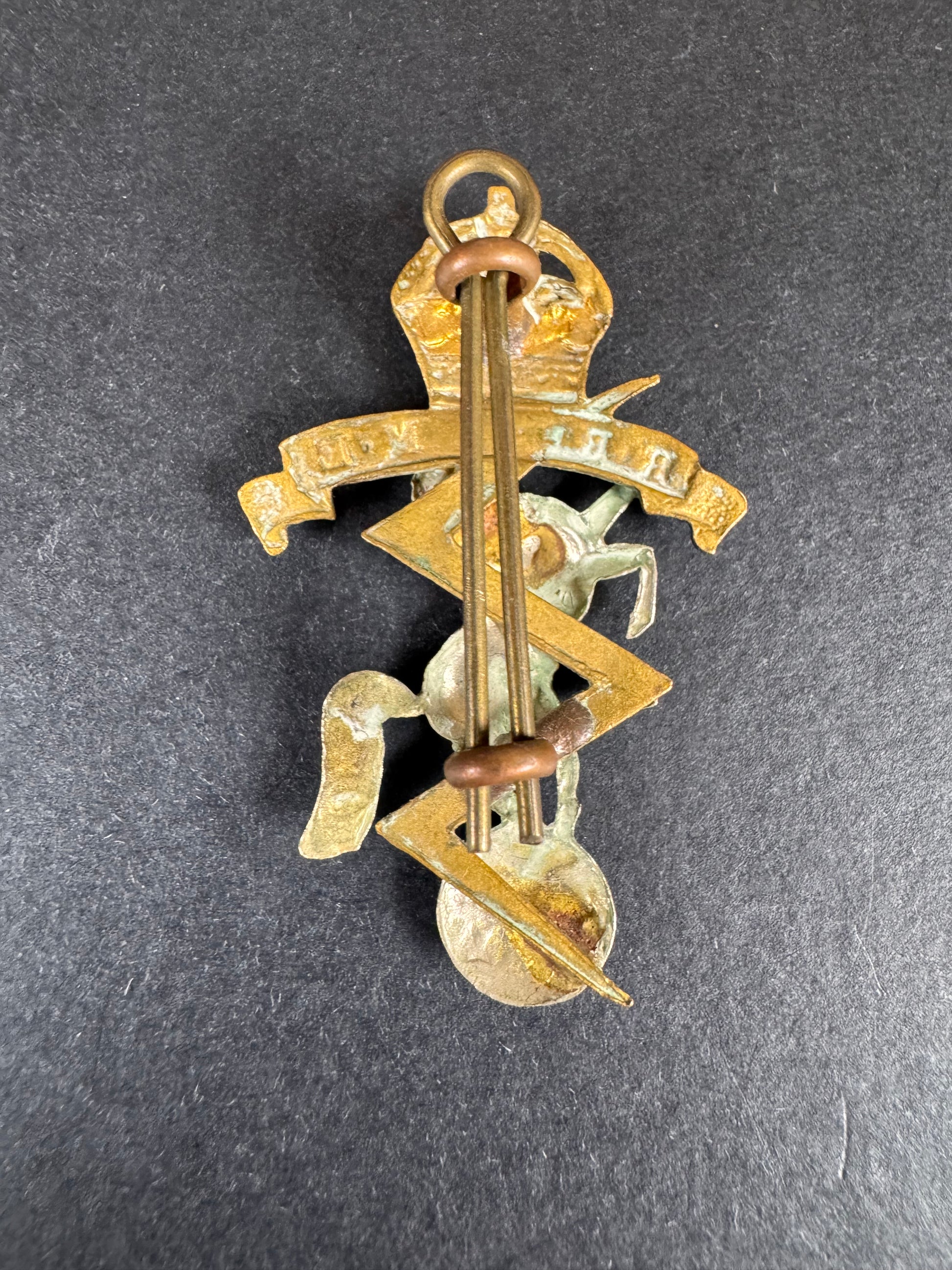 Photo 2 of After WW2 British Army Royal Electrical & Mechanical Engineers Cap Badge - collectible militaria item