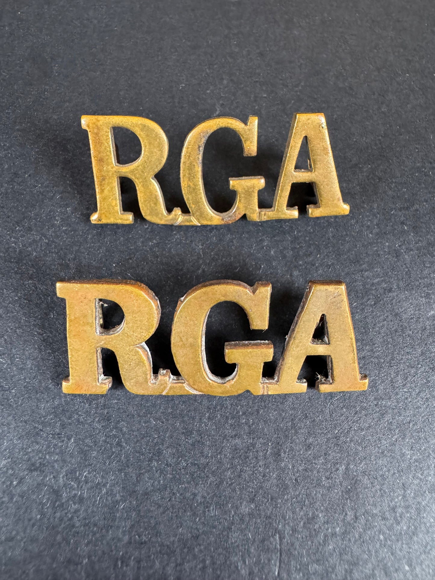 Photo 1 of WW1 British Army Royal Garrison Artillery Uniform Shoulder Title Badges - collectible militaria item