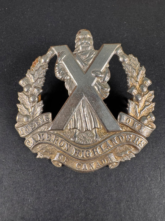Photo 1 of WW2 Canadian Army Queen's Own Cameron Highlanders of Canada Cap Badge - collectible militaria item