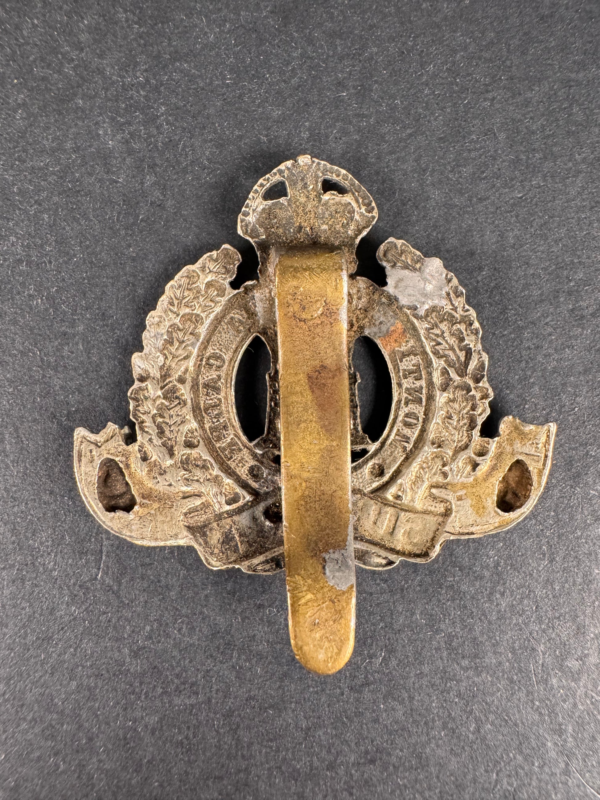 Photo 2 of WW1 British Army Suffolk Regiment Cap Badge - collectible militaria item