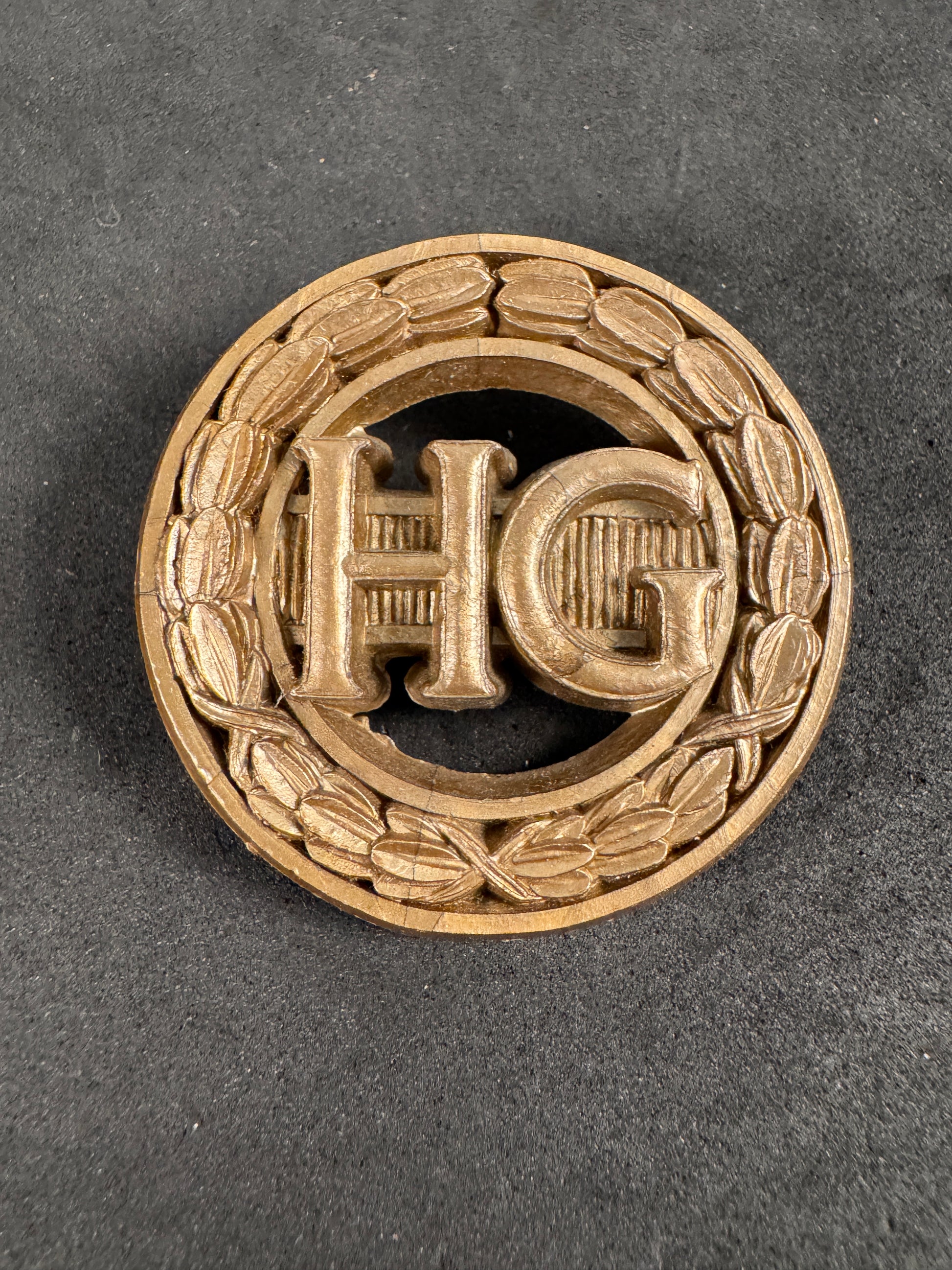 Photo 1 of WW2 British Army Home Guard (HG) Plastic Economy Cap Badge - collectible militaria item