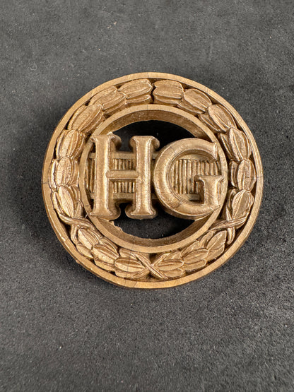 Photo 1 of WW2 British Army Home Guard (HG) Plastic Economy Cap Badge - collectible militaria item