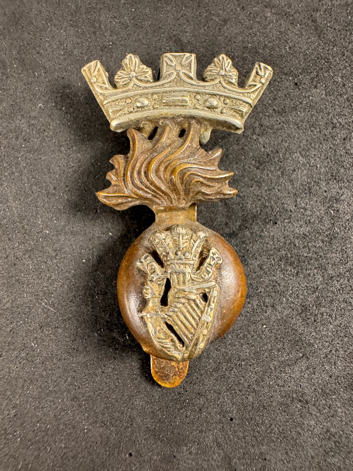 Photo 1 of WW1 British Army Royal Irish Fusiliers Cap Badge - collectible militaria item