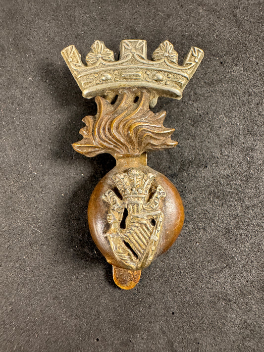 Photo 1 of WW1 British Army Royal Irish Fusiliers Cap Badge - collectible militaria item