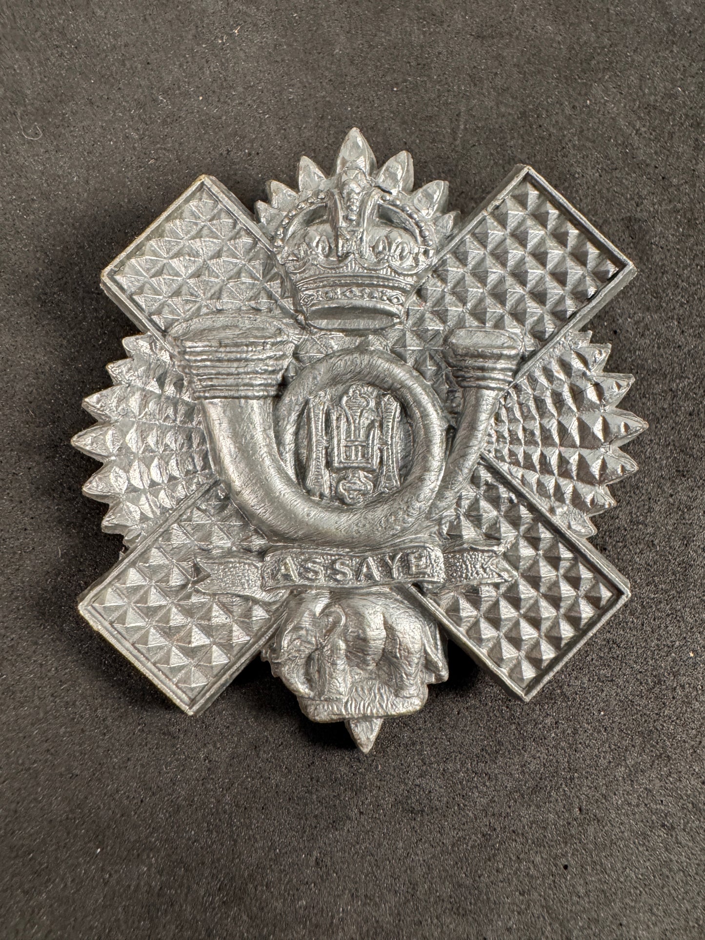 Photo 1 of WW2 British Army Highland Light Infantry Plastic Economy Cap Badge - collectible militaria item