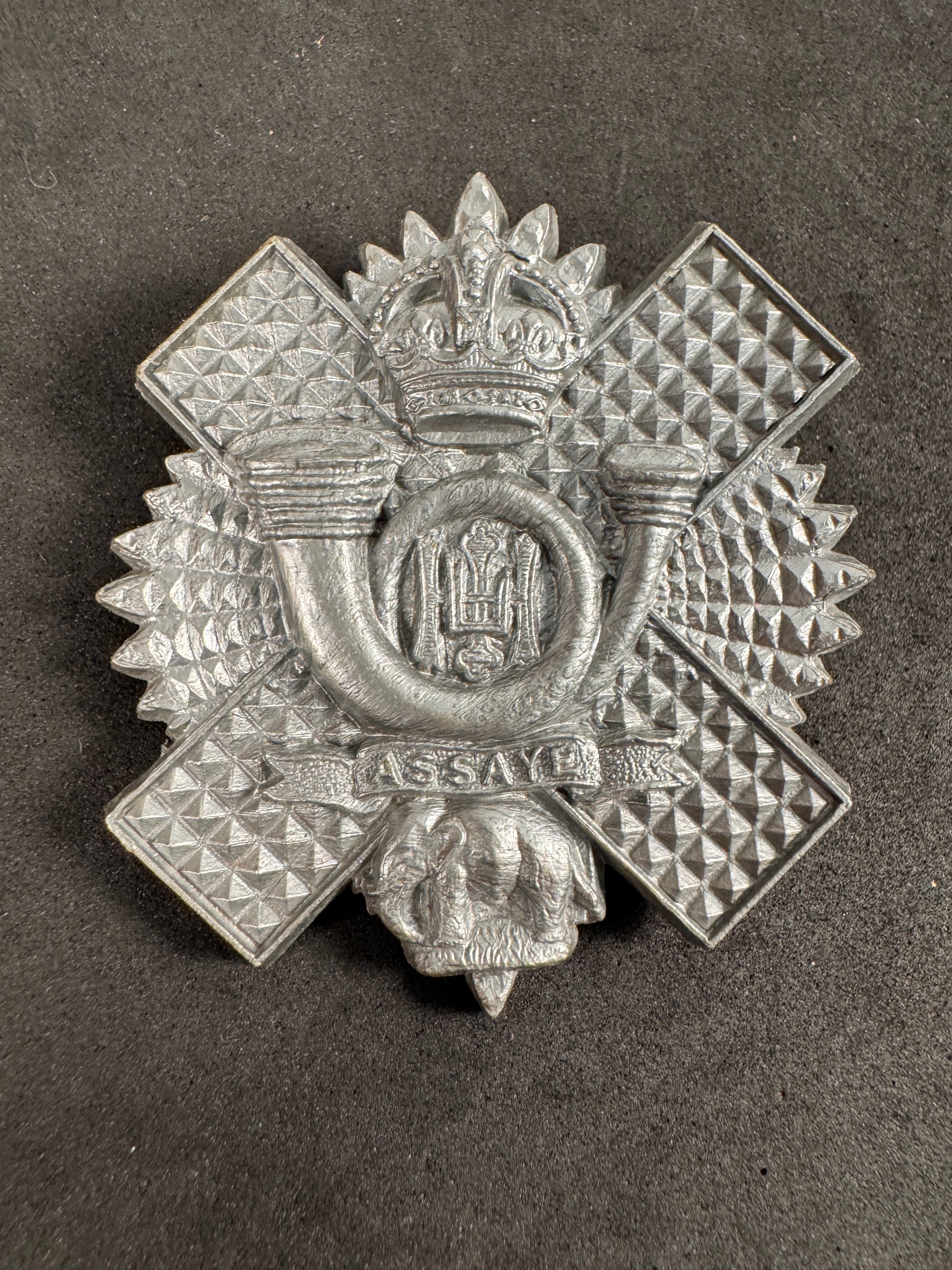 Photo 1 of WW2 British Army Highland Light Infantry Plastic Economy Cap Badge - collectible militaria item