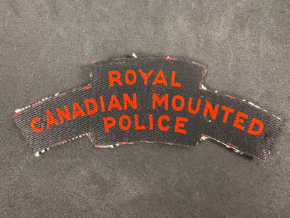 Photo 1 of WW2 Royal Canadian Mounted Police (RCMP) Screen Printed Shoulder Title - collectible militaria item