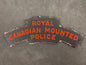 Photo 1 of WW2 Royal Canadian Mounted Police (RCMP) Screen Printed Shoulder Title - collectible militaria item