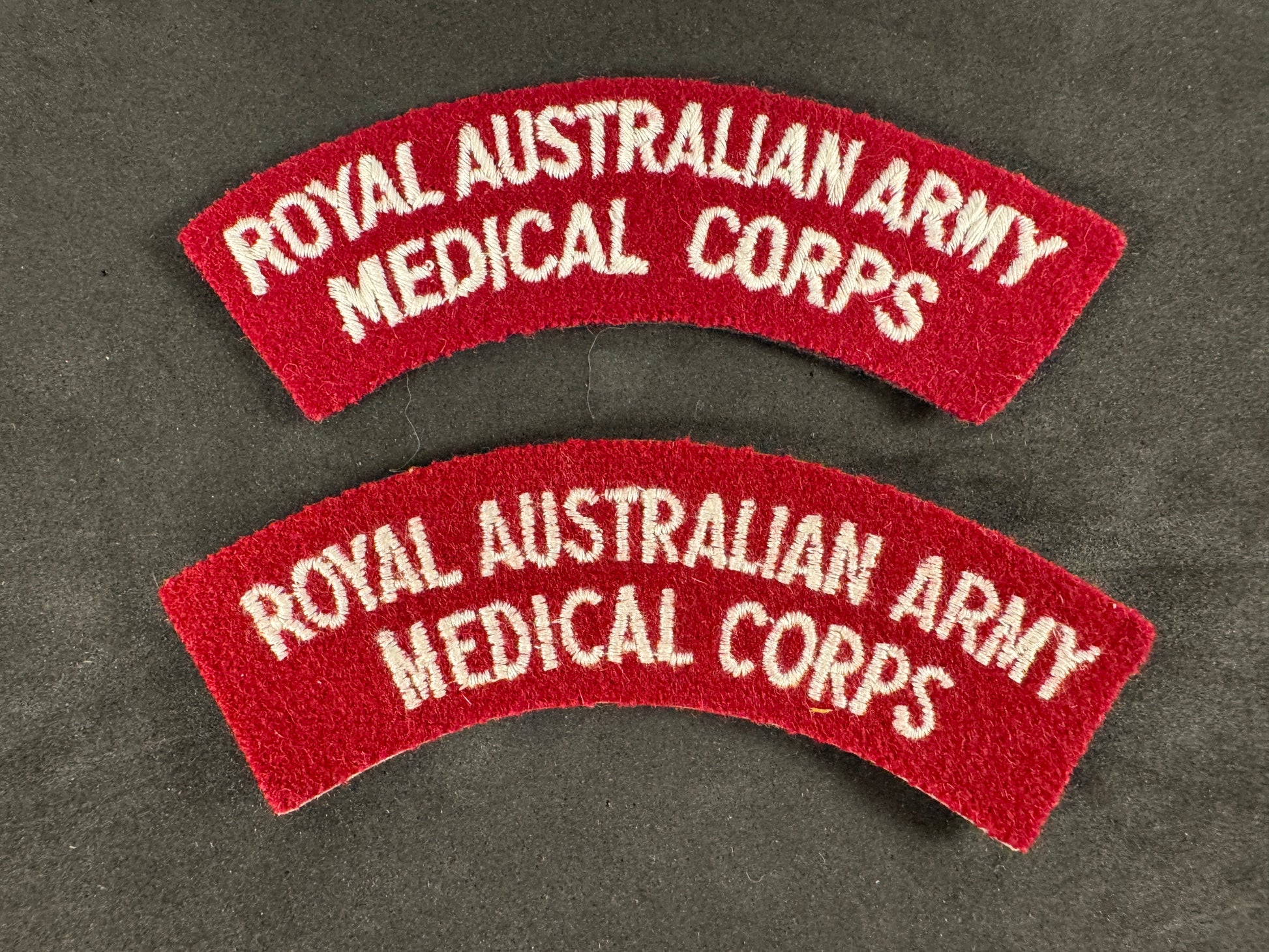 Photo 1 of Royal Australian Army Medical Corps Shoulder Titles (Pair) - collectible militaria item