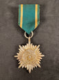 Photo 1 of WW2 German Eastern People's Medal (Ostvolk) 2nd Class With Swords - collectible militaria item
