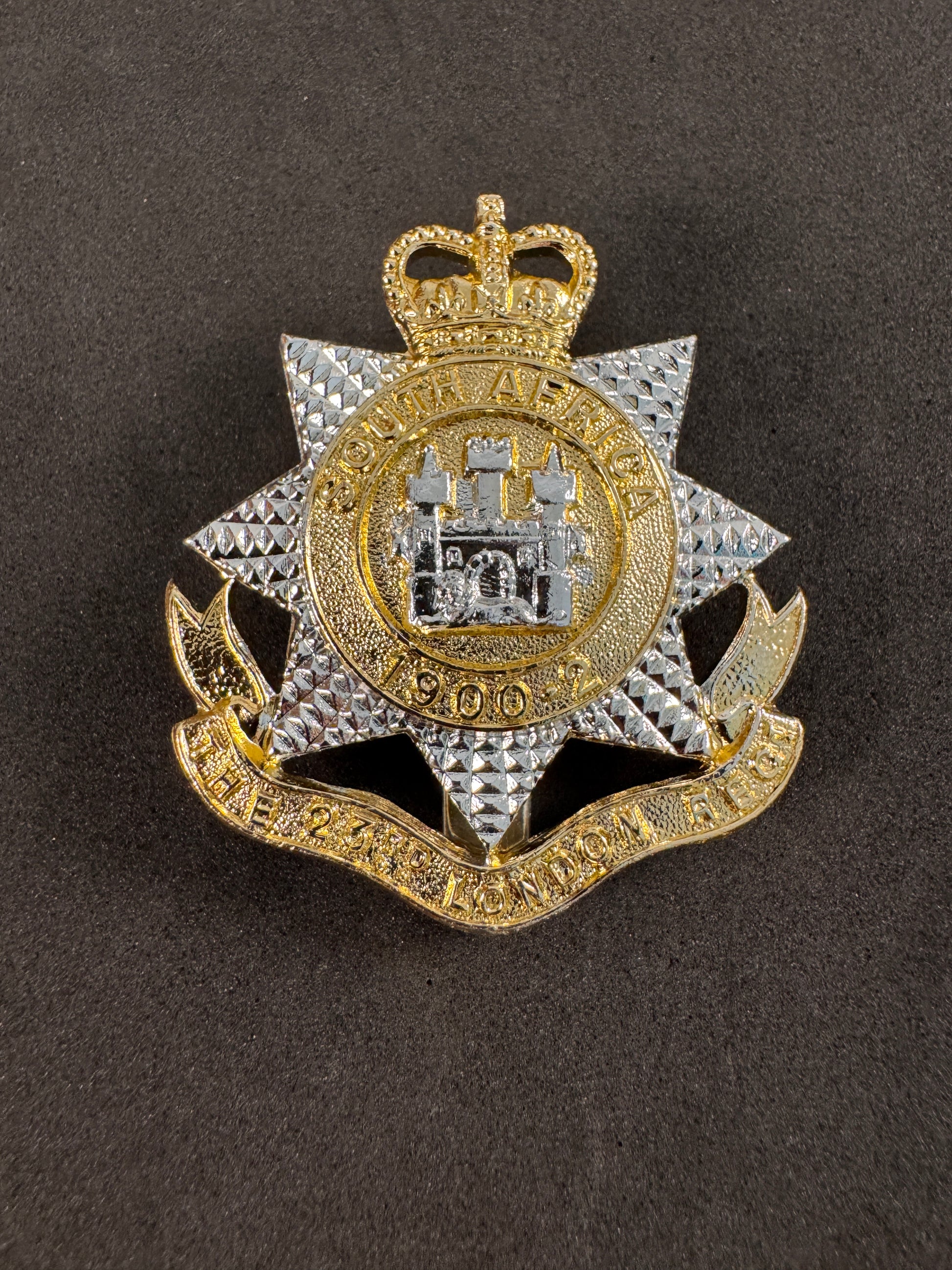 Photo 1 of British Territorial Army 23rd London Regiment Cap Badge - collectible militaria item